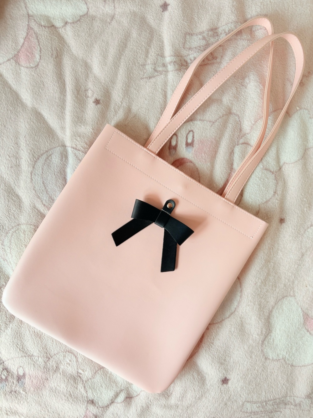 Light Pink Tote Bag with Black Bow Accent faux leather